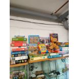 Large lot of puzzles etc .