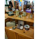 2 shelf's of collectables includes bells whisky decanters etc .