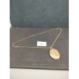 9ct gold belchar chain 10 grams in weight together with yellow metal locket.