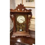 Large American Gingerbread Mantel Clock with key And Pendulum stands 56 cms tall.