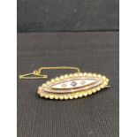 15ct gold victorian morning brooch set with sapphire and diamonds . 7 grams .