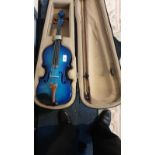 Beautiful Cobalt Blue Violin with carry case and bow.