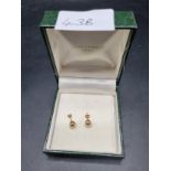 Pair of 9ct gold pierced ball earrings.