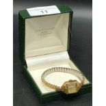9ct gold cased watch with expanding bracelet .