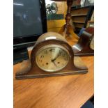 2 hole art deco clock with pendulum.