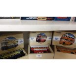 Shelf of Corgi Buses Boxed .