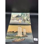 Pair of early oriental paintings depicting boat scene and oriental gathering scene on rice paper