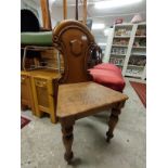 Antique church design chair in oak .