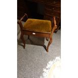 1900s piano stool with storage compartment.