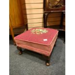 Queen Anne legged stool with flower decorative pattern.