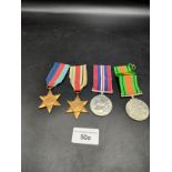 Group of 4 world war two medals 1939-45 includes African star medal .