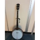 Vintage 4 string Banjo very good quality.