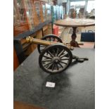 Large heavy cast metal and brass cannon .
