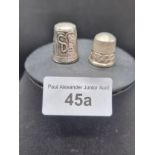 2 Silver hall marked thimbles includes souvenir Charles and Diana wedding silver thimble .