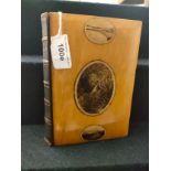 Antique mauchline ware fronted and back book titled Shakespeare s works .