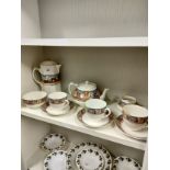Shelf of Crown Ducal Dutch style tea wares includes tea pot etc.
