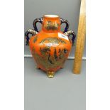 Beautiful Orange ground Oriental Dragon 3 footed vase With sea serpent Handles stands 20cms tall