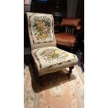Victorian tapestry covered nursing chair with original caster s .