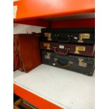 Lot of cases and leather satchel.