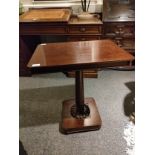 Antique pedestal table .