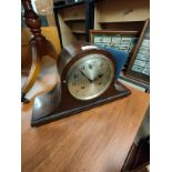 2 hole art deco clock with pendulum.