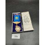 Silver hall marked masonic jewel makers RC with presentation details in original box.