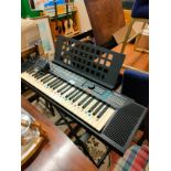 Yamaha PSR 110 organ on stand with box and adapter .