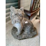 Large garden stone westie dog ornament .