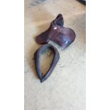 Leather Saddle And Horse Collar .