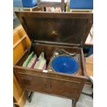 Antique 1900s Sylaphone record player in fitted 1900s cabinet .
