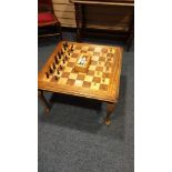 Fantastic Chess Table with chess board top with carved edges leading to carved top queen Anne legs.