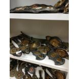 Shelf of quality horse brasses..