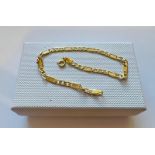 14ct gold dainty figuro bracelet 19cm in length new in box .