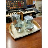 5 piece piquot ware tea service includes tray.