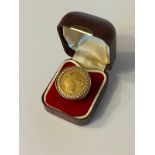 Gold sovereign dated 1872 in 9ct.gold 375 hallmakred set ring .