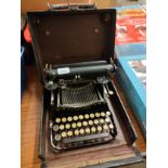 Antique corona typewriter with folding mechanism in fitted case .