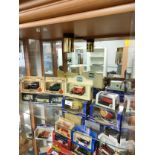 Shelf of car models to include lledo .