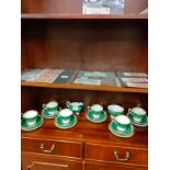 Art deco foley matt green back ground tea service .