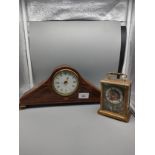 Inlaid beautiful clock together with brass carriage acctim clock .