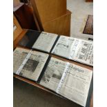4 albums of world war two news papers .