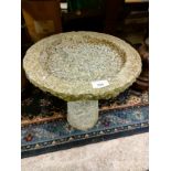 Stone bird bath .