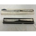 Silver handled kings pattern cake knife together with silver handled kings pattern butter knife .