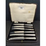Set of 6 silver hall marked handled tea knifes in fitted case .