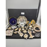 Lot of military Cap badges collectables etc .