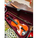 Quality violin with bow in fitted case .