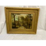 Gilt framed oil on canvis church city signed EG.