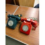 2 vintage style telephones .