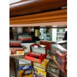 Shelf of bus and tram models includes yesteryear.