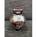1900s cranberry vase with silver overlay .