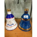 2 Bells decanters full and sealed .